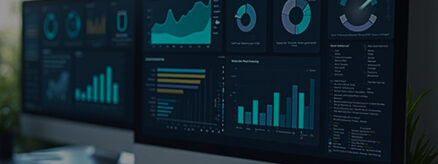 Photo of screen computers with a dashboard that has data